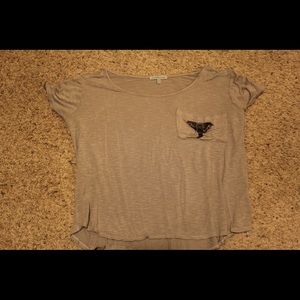 Short sleeve shirt with elephant on the pocket